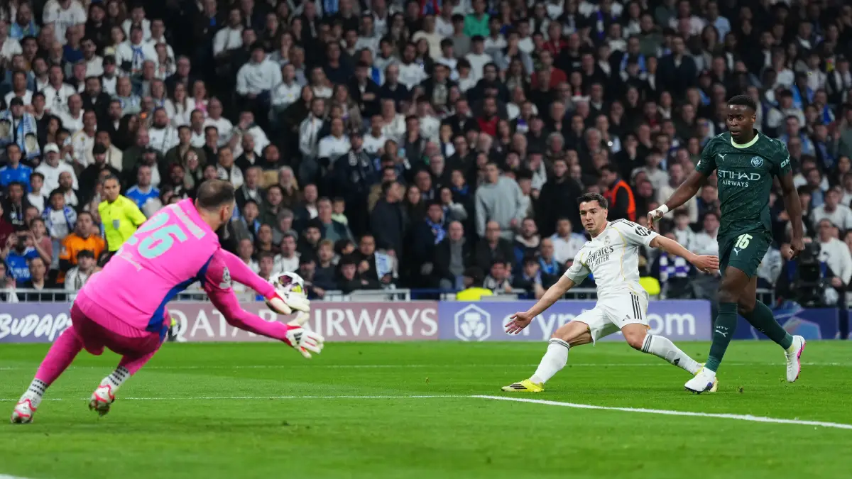 MADRID, SPAIN - MARCH 11: Brahim Diaz of Real Madrid shoots as Gianluigi Donnarumma of Manchester City makes a save during the UEFA Champions League 2025/26 Round of 16 First Leg match between Real Madrid CF and Manchester City FC at Estadio Santiago Bernabeu on March 11, 2026 in Madrid, Spain. (Photo by Angel Martinez/Getty Images)