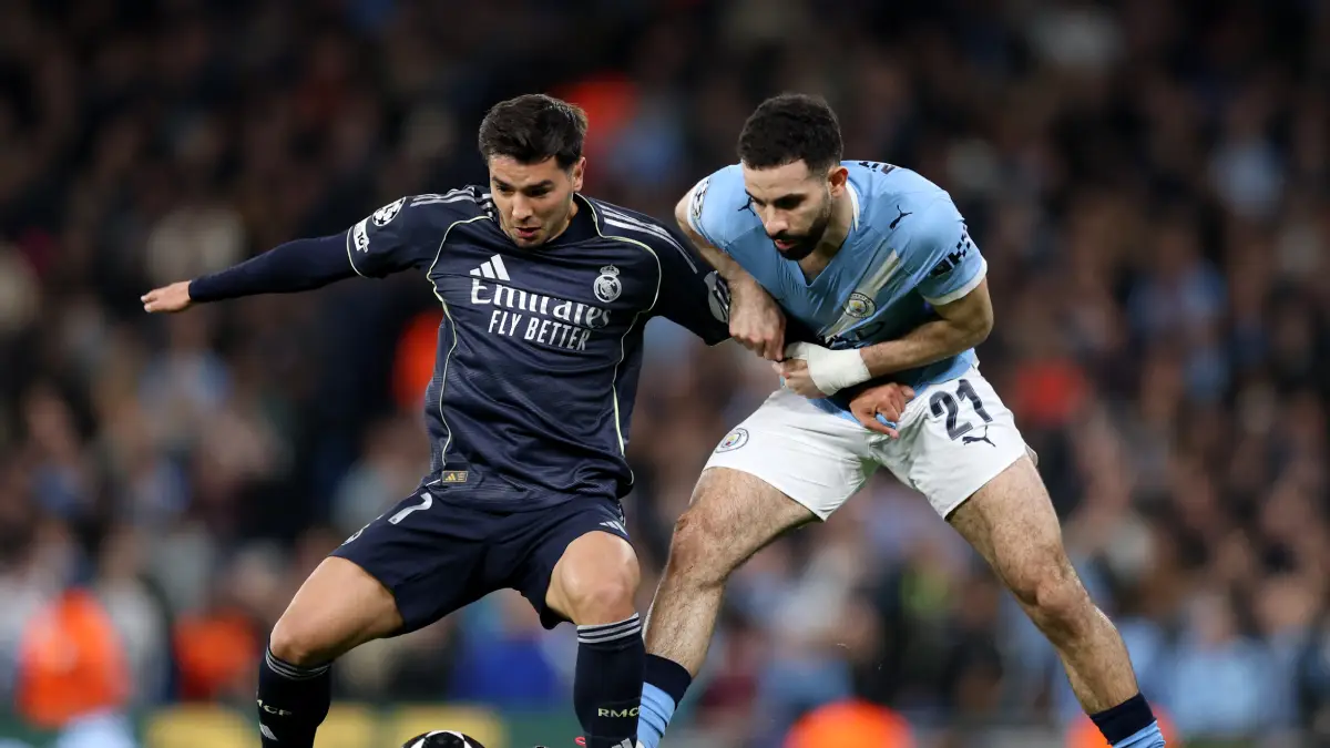 MANCHESTER, ENGLAND - MARCH 17: Brahim Diaz of Real Madrid battles for possession with Rayan Ait-Nouri of Manchester City during the UEFA Champions League 2025/26 Round of 16 Second Leg match between Manchester City FC and Real Madrid CF at City of Manchester Stadium on March 17, 2026 in Manchester, England. (Photo by Michael Regan/Getty Images)