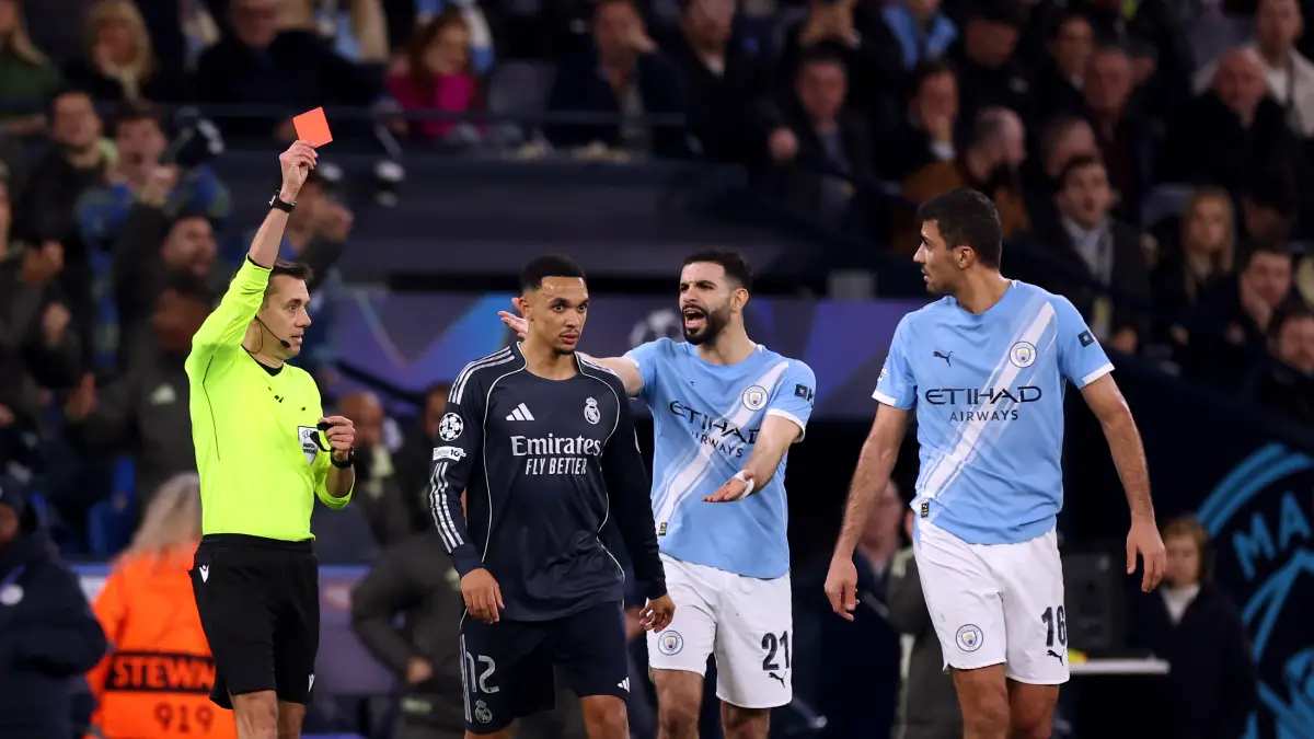 MANCHESTER, ENGLAND - MARCH 17: Referee Clement Turpin shows a red card to Bernardo Silva of Manchester City (not pictured) during the UEFA Champions League 2025/26 Round of 16 Second Leg match between Manchester City FC and Real Madrid CF at City of Manchester Stadium on March 17, 2026 in Manchester, England. (Photo by Carl Recine/Getty Images)