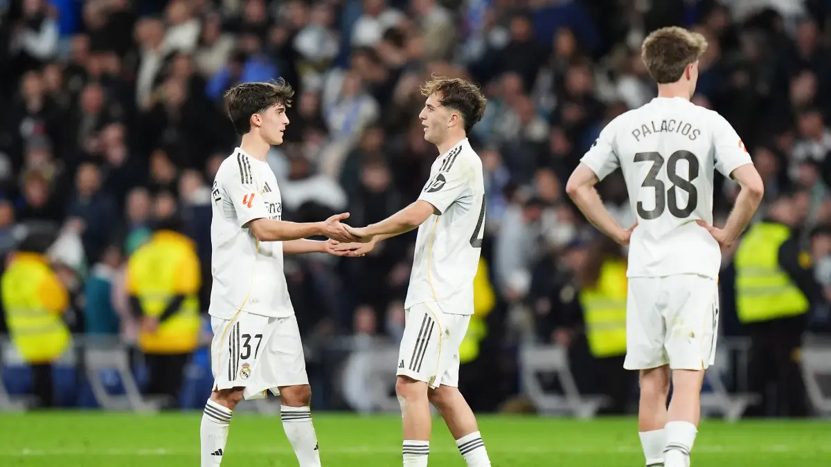 MADRID, SPAIN - MARCH 14: Manuel Angel and Dani Yanez of Real Madrid celebrate the teams victory in the LaLiga EA Sports match between Real Madrid CF and Elche CF at Estadio Santiago Bernabeu on March 14, 2026 in Madrid, Spain. (Photo by Angel Martinez/Getty Images)