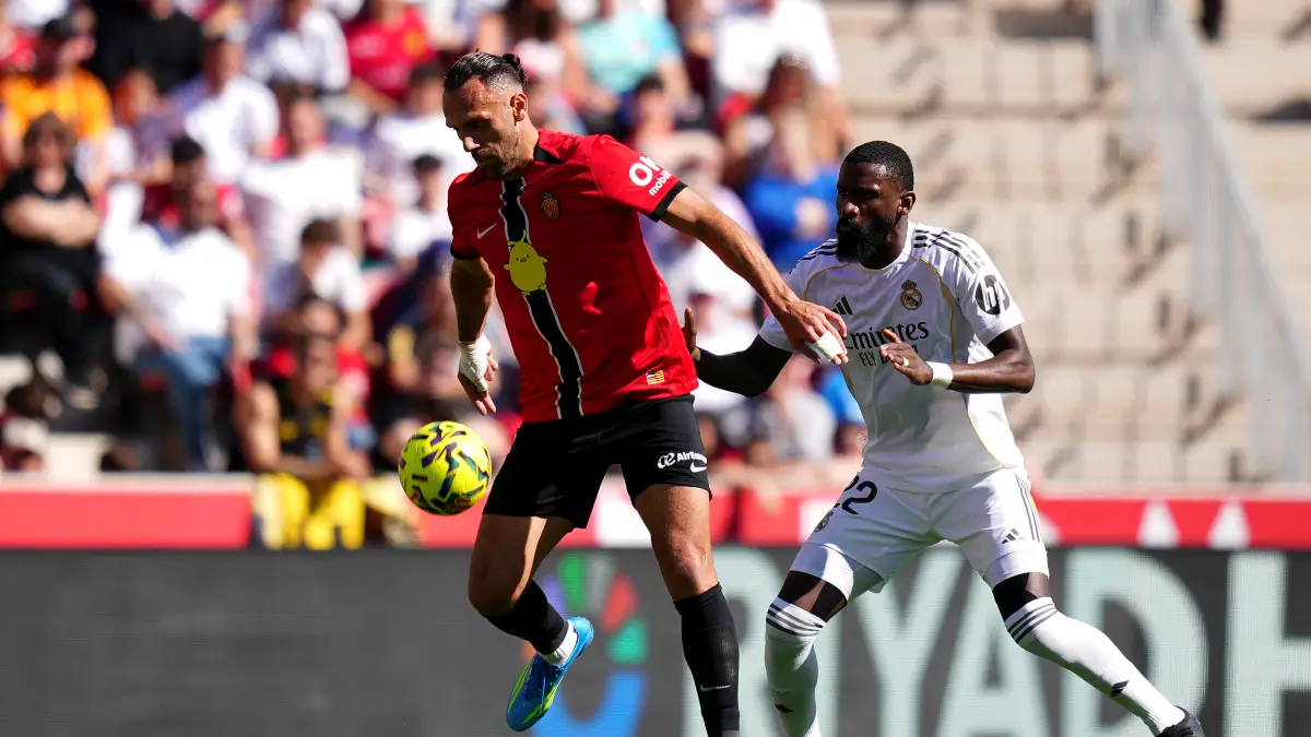 MALLORCA, SPAIN - APRIL 04: Vedat Muriqi of RCD Mallorca is challenged by Antonio Ruediger of Real Madrid during the LaLiga EA Sports match between RCD Mallorca and Real Madrid CF at Estadio Daredevil Son Moix on April 04, 2026 in Mallorca, Spain. (Photo by Alex Caparros/Getty Images)
