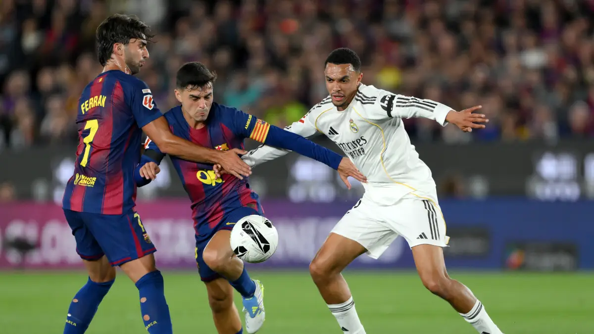 BARCELONA, SPAIN - MAY 10: Ferran Torres reacts as Pedri of FC Barcelona challenges Trent Alexander-Arnold of Real Madrid during the LaLiga EA Sports match between FC Barcelona and Real Madrid CF at Spotify Camp Nou on May 10, 2026 in Barcelona, Spain. (Photo by David Ramos/Getty Images)