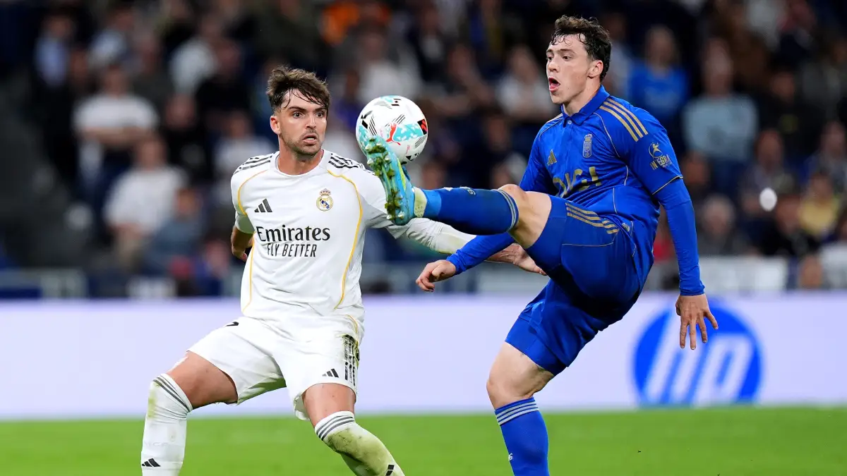 MADRID, SPAIN - MAY 14: Federico Vinas of Real Oviedo controls the ball while under pressure from Raul Asencio of Real Madrid during the LaLiga EA Sports match between Real Madrid CF and Real Oviedo at Estadio Santiago Bernabeu on May 14, 2026 in Madrid, Spain. (Photo by Angel Martinez/Getty Images)