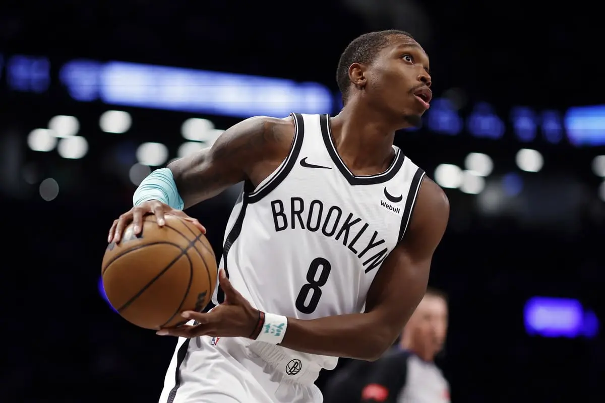 NEW YORK, NEW YORK - MARCH 19: Lonnie Walker IV #8 of the Brooklyn Nets dribbles during the second half against the New Orleans Pelicans at Barclays Center on March 19, 2024 in the Brooklyn borough of New York City. (Photo by Sarah Stier/Getty Images)