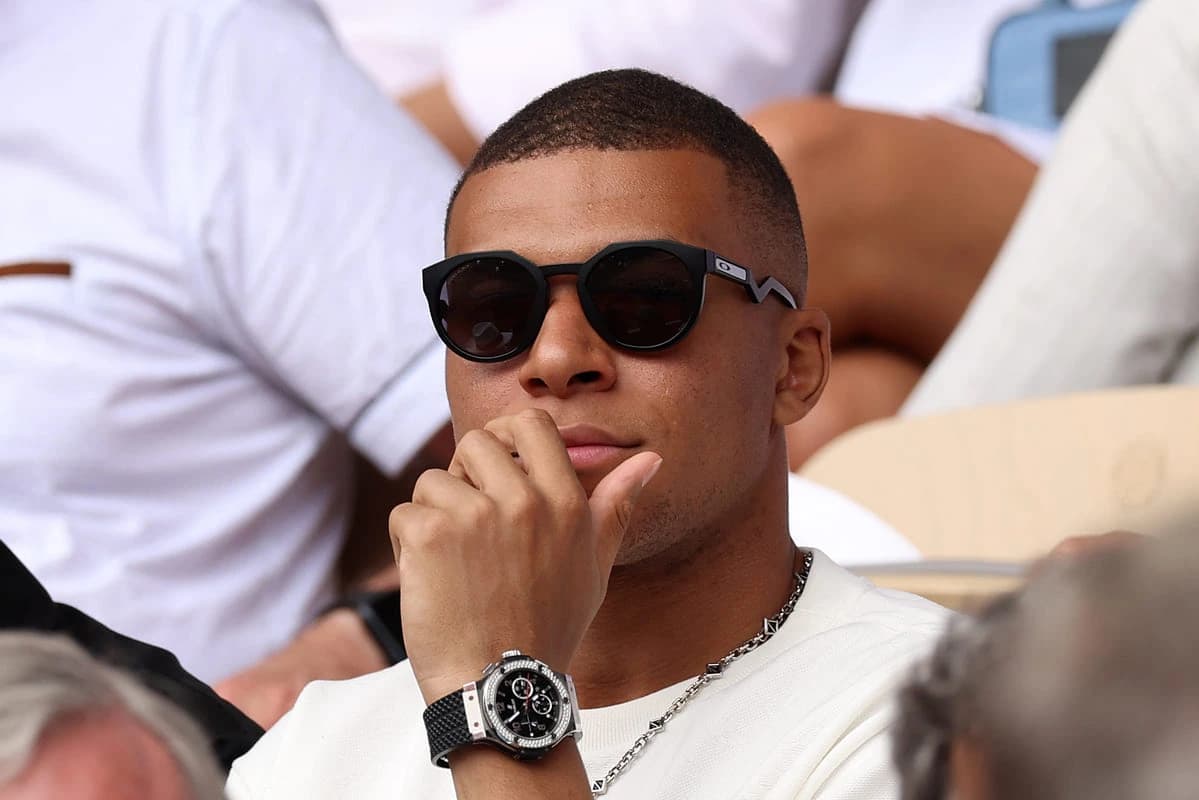 PARIS, FRANCE - JUNE 11: Footballer Kylian Mbappe is seen attending the Men's Singles Final match between Novak Djokovic of Serbia and Casper Ruud of Norway on Day Fifteen of the 2023 French Open at Roland Garros on June 11, 2023 in Paris, France. (Photo by Clive Brunskill/Getty Images)
