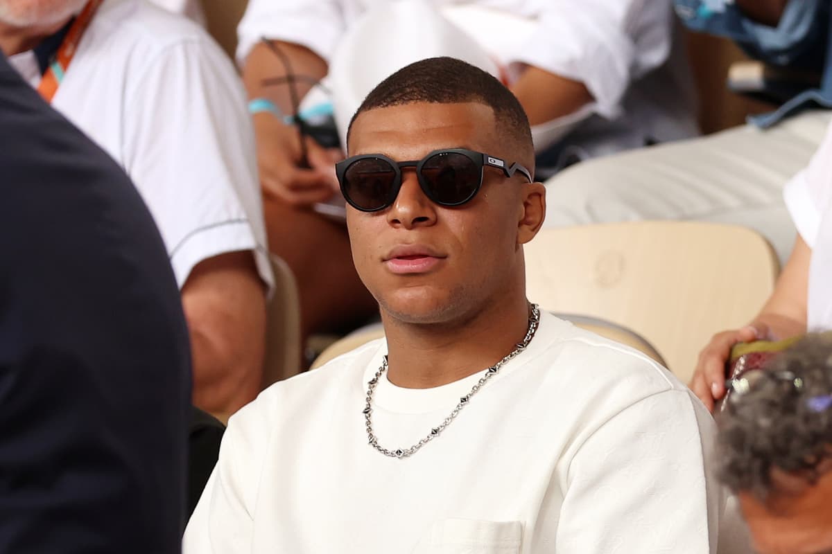 PARIS, FRANCE - JUNE 11: Footballer Kylian Mbappe is seen attending the Men's Singles Final match between Novak Djokovic of Serbia and Casper Ruud of Norway on Day Fifteen of the 2023 French Open at Roland Garros on June 11, 2023 in Paris, France. (Photo by Clive Brunskill/Getty Images)