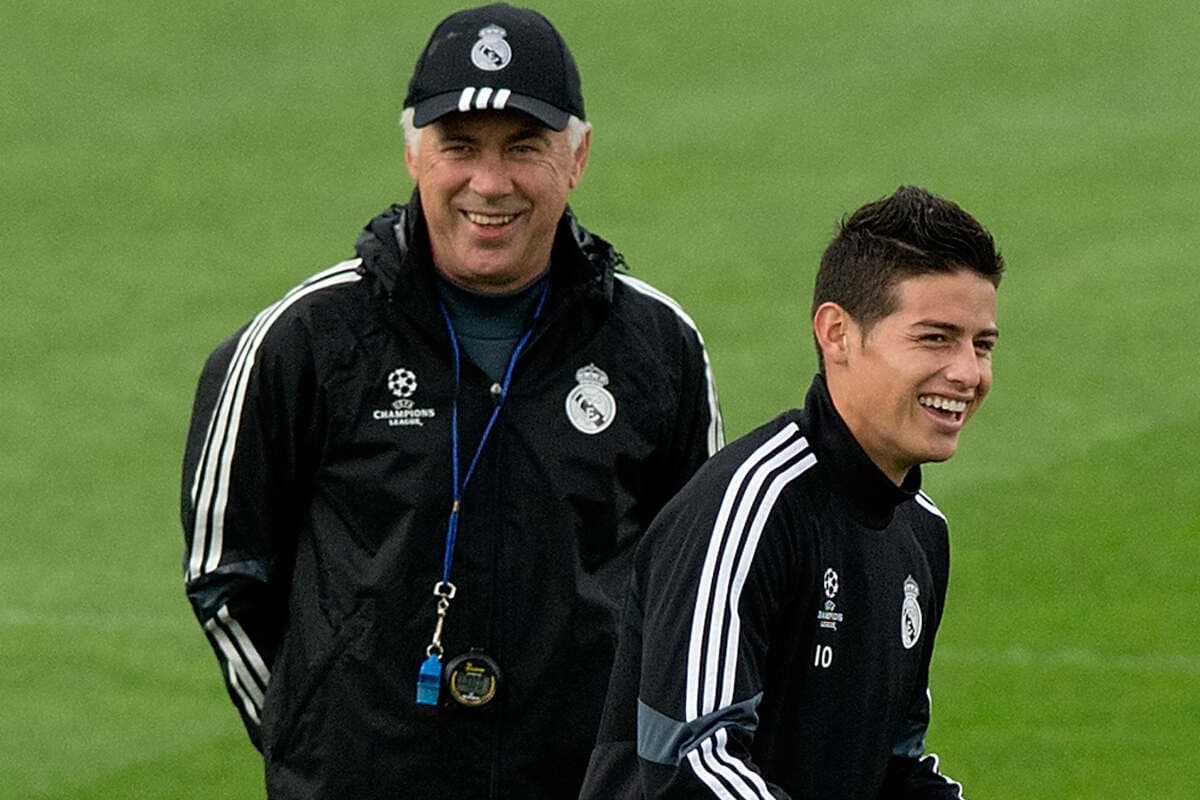 MADRID, SPAIN - NOVEMBER 03: James Rodriguez (R) of Real Madrid CF laughs ahead his head coach Carlo Ancelotti (L) during the training session ahead of the UEFA Champions League Group B match between Real Madrid CF and Liverpool FC at Valdebebas training ground on November 3, 2014 in Madrid, Spain. (Photo by Gonzalo Arroyo Moreno/Getty Images)