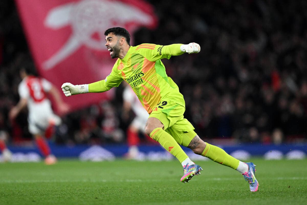 LONDON, ENGLAND - APRIL 08: David Raya of Arsenal celebrates after team mate Declan Rice of Arsenal (not pictured) scores his team's first goal during the UEFA Champions League 2024/25 Quarter Final First Leg match between Arsenal FC and Real Madrid C.F. at Emirates Stadium on April 08, 2025 in London, England. (Photo by Justin Setterfield/Getty Images)