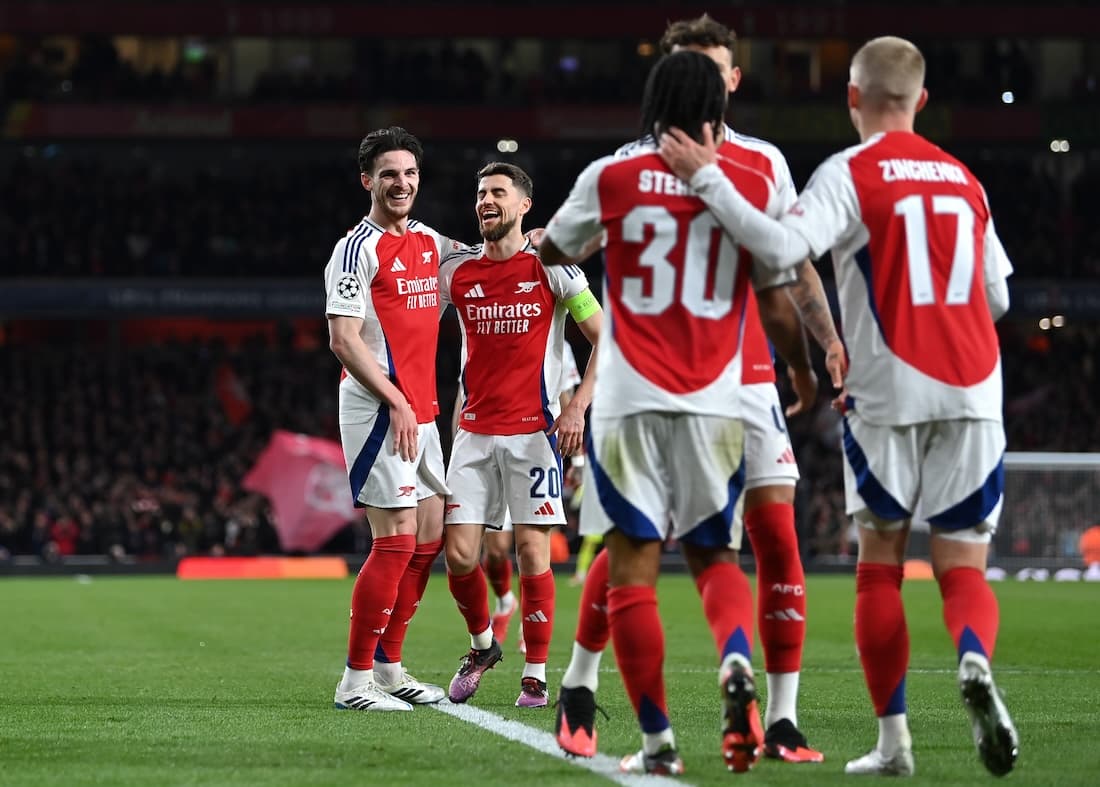 LONDON, ENGLAND - MARCH 12: Declan Rice of Arsenal celebrates scoring his team's second goal with teammate Jorginho and teammates during the UEFA Champions League 2024/25 Round of 16 Second Leg match between Arsenal FC and PSV at Arsenal Stadium on March 12, 2025 in London, England. (Photo by Justin Setterfield/Getty Images)