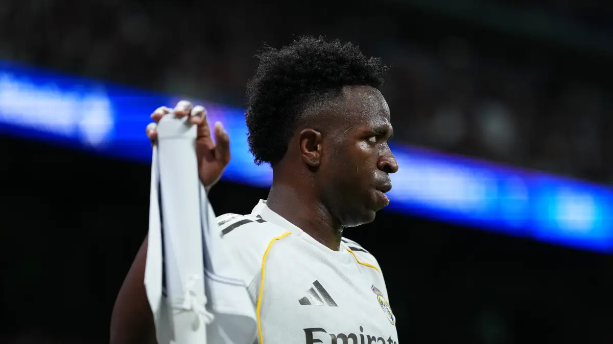 MADRID, SPAIN - APRIL 07: Vinicius Junior of Real Madrid looks on from the corner flag during the UEFA Champions League 2025/26 Quarter-Final First Leg match between Real Madrid CF and FC Bayern München at Estadio Santiago Bernabeu on April 07, 2026 in Madrid, Spain. (Photo by Angel Martinez/Getty Images)