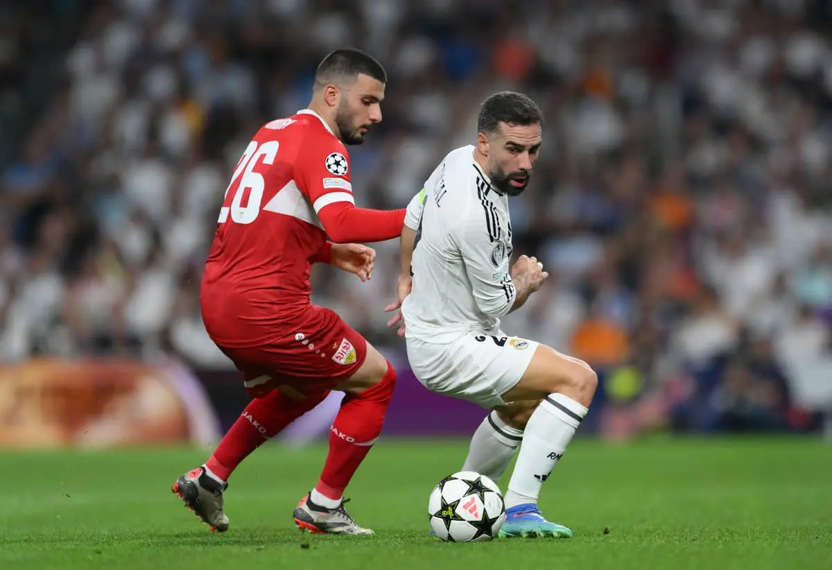Dani Carvajal ici au duel avec Undav lors de la rencontre de Ligue des champions face à Stuttgart (Photo by David Ramos/Getty Images)