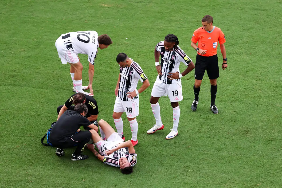 ORLANDO, FLORIDA - JUNE 26: Nicolo Savona #37 of Juventus FC receives medical treatment during the FIFA Club World Cup 2025 group G match between Juventus FC and Manchester City FC at Camping World Stadium on June 26, 2025 in Orlando, Florida. (Photo by Megan Briggs/Getty Images)