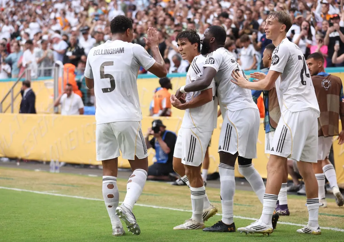MIAMI GARDENS, FLORIDA - JULY 01: Gonzalo Garcia #30 of Real Madrid C.F. celebrates scoring his team's first goal with Antonio Ruediger #22, Dean Huijsen #24 and Jude Bellingham #5 of Real Madrid C.F. during the FIFA Club World Cup 2025 round of 16 match between Real Madrid CF and Juventus FC at Hard Rock Stadium on July 01, 2025 in Miami Gardens, Florida. (Photo by Megan Briggs/Getty Images).