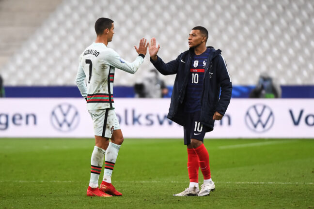 Cristiano RONALDO of Portugal and Kylian MBAPPE of France after the Nations League - Group 3 match between France and Portugal on October 11, 2020 in Paris, France. (Photo by Baptiste Fernandez/Getty Image)