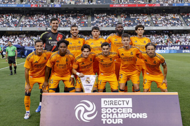 Real Madrid players pose for a team photo before during the pre-season club friendly football match between AC Milan and Real Madrid at Soldier Field in Chicago, Illinois, on July 31, 2024. (Photo by KAMIL KRZACZYNSKI / AFP) (Photo by KAMIL KRZACZYNSKI/AFP via Getty Images)