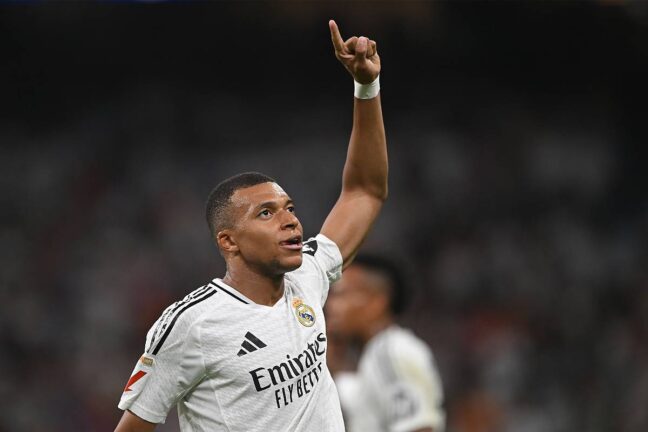 Kylian Mbappé après son premier but face au Betis (Photo by Denis Doyle/Getty Images).