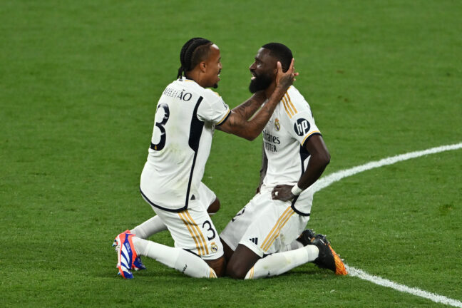 LONDON, ENGLAND - JUNE 01: Eder Militao and Antonio Ruediger of Real Madrid celebrate at full time following the team's victory during the UEFA Champions League 2023/24 Final match between Borussia Dortmund and Real Madrid CF at Wembley Stadium on June 01, 2024 in London, England. (Photo by Dan Mullan/Getty Images)