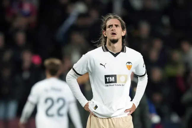 BARCELONA, SPAIN - APRIL 29: Yarek Gasiorowski of Valencia CF reacts at full-time following the team's defeat in the LaLiga EA Sports match between FC Barcelona and Valencia CF at Estadi Olimpic Lluis Companys on April 29, 2024 in Barcelona, Spain. (Photo by Alex Caparros/Getty Images) (Photo by Alex Caparros/Getty Images) Real Madrid