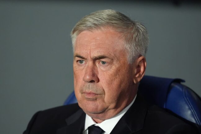 SAN SEBASTIAN, SPAIN - SEPTEMBER 14: Carlo Ancelotti, Head Coach of Real Madrid, looks on prior to the LaLiga match between Real Sociedad and Real Madrid CF at Reale Arena on September 14, 2024 in San Sebastian, Spain. (Photo by Juan Manuel Serrano Arce/Getty Images).