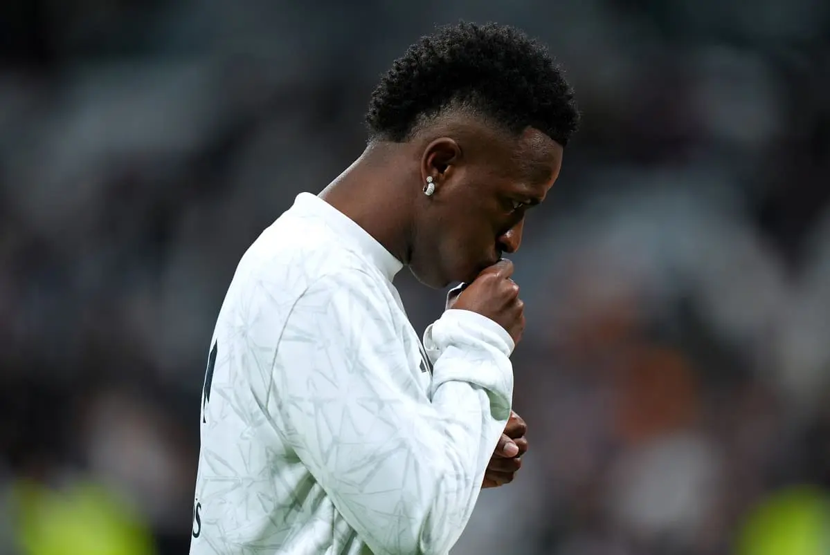 MADRID, SPAIN - OCTOBER 26: Vinicius Jr of Real Madrid reacts ahead of the LaLiga match between Real Madrid CF and FC Barcelona at Estadio Santiago Bernabeu on October 26, 2024 in Madrid, Spain. (Photo by Angel Martinez/Getty Images).