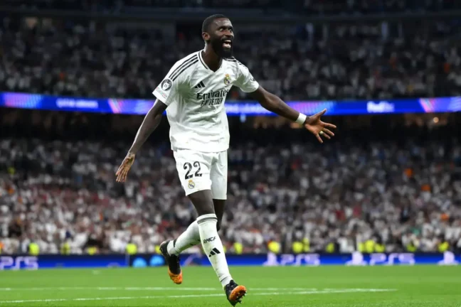 MADRID, SPAIN - SEPTEMBER 17: Antonio Ruediger of Real Madrid celebrates scoring his team's second goal during the UEFA Champions League 2024/25 League Phase MD1 match between Real Madrid CF and VfB Stuttgart at Estadio Santiago Bernabeu on September 17, 2024 in Madrid, Spain. (Photo by David Ramos/Getty Images).