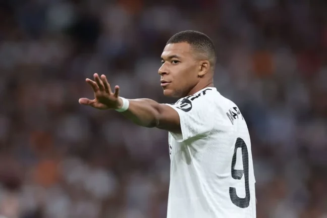 MADRID, SPAIN - OCTOBER 05: Kylian Mbappe of Real Madrid CF reacts during the LaLiga match between Real Madrid CF and Villarreal CF at Estadio Santiago Bernabeu on October 05, 2024 in Madrid, Spain. (Photo by Gonzalo Arroyo Moreno/Getty Images).