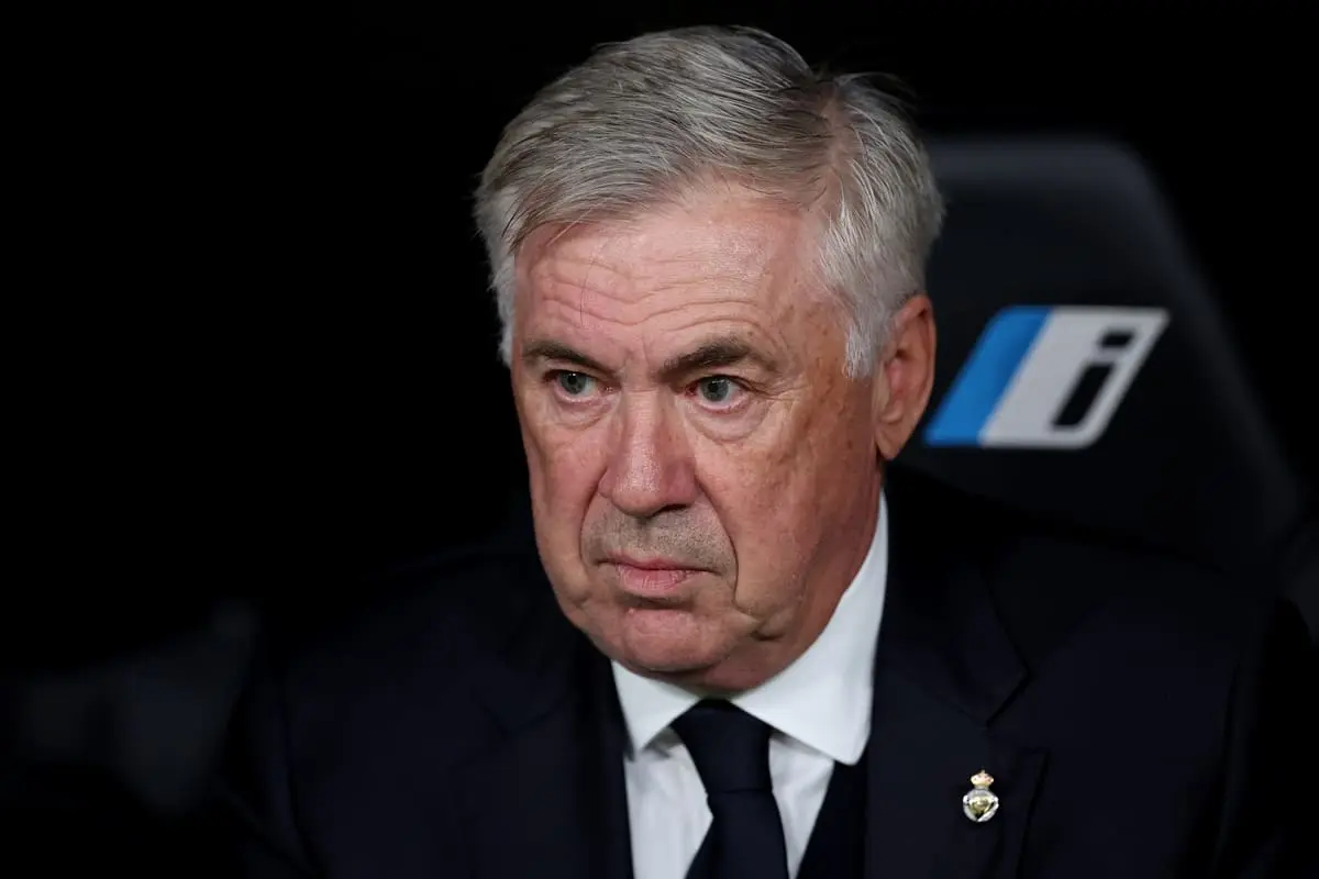 MADRID, SPAIN - OCTOBER 05: Manager Carlo Ancelotti of Real Madrid CF reacts at the bench prior to start the LaLiga match between Real Madrid CF and Villarreal CF at Estadio Santiago Bernabeu on October 05, 2024 in Madrid, Spain. (Photo by Gonzalo Arroyo Moreno/Getty Images).
