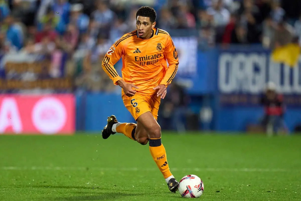 LEGANES, SPAIN - NOVEMBER 24: Jude Bellingham of Real Madrid runs with the ball during the LaLiga match between CD Leganes and Real Madrid CF at Estadio Municipal de Butarque on November 24, 2024 in Leganes, Spain. (Photo by Angel Martinez/Getty Images)