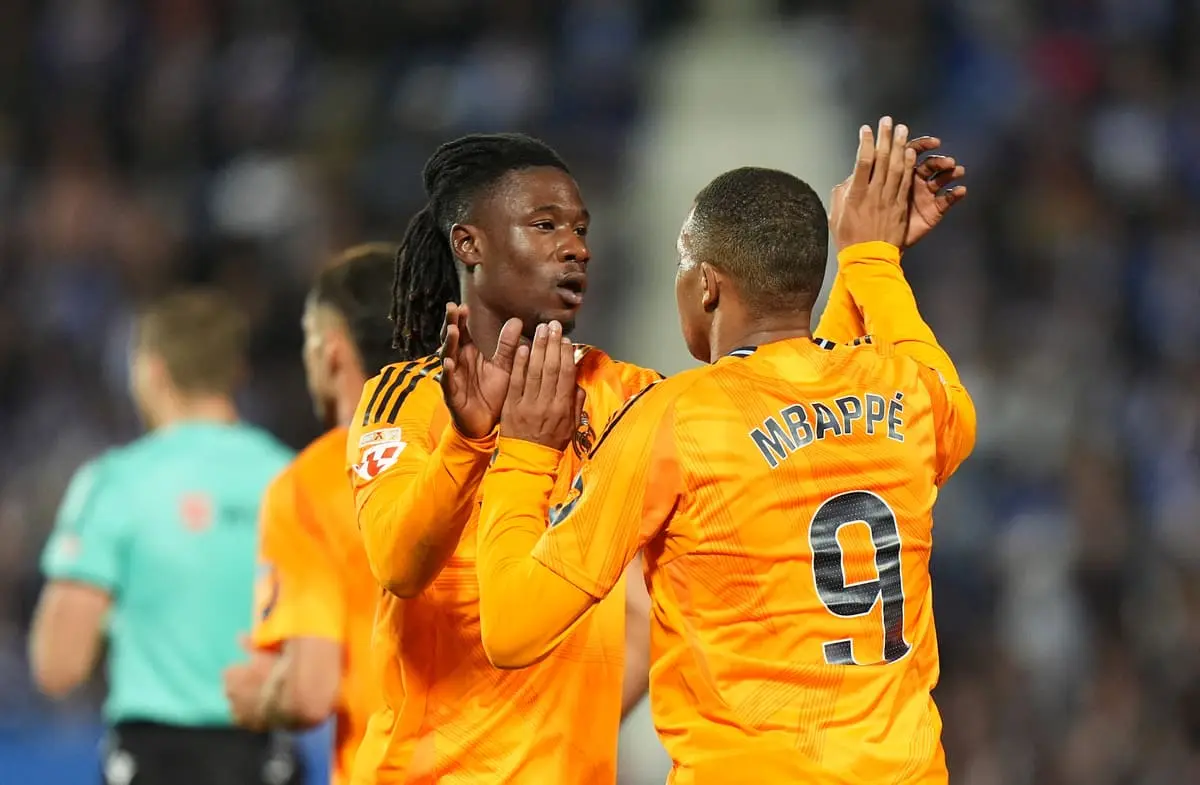 LEGANES, SPAIN - NOVEMBER 24: Kylian Mbappe of Real Madrid celebrates scoring his team's first goal with teammate Eduardo Camavinga during the LaLiga match between CD Leganes and Real Madrid CF at Estadio Municipal de Butarque on November 24, 2024 in Leganes, Spain. (Photo by Angel Martinez/Getty Images).