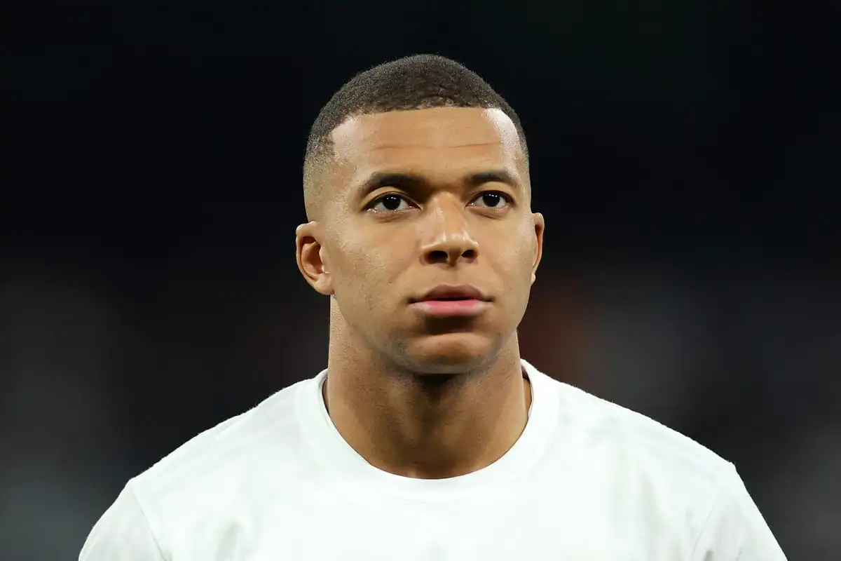 MADRID, SPAIN - NOVEMBER 05: Kylian Mbappe of Real Madrid looks on prior to kick-off ahead of the UEFA Champions League 2024/25 League Phase MD4 match between Real Madrid C.F. and AC Milan at Estadio Santiago Bernabeu on November 05, 2024 in Madrid, Spain. (Photo by Florencia Tan Jun/Getty Images)