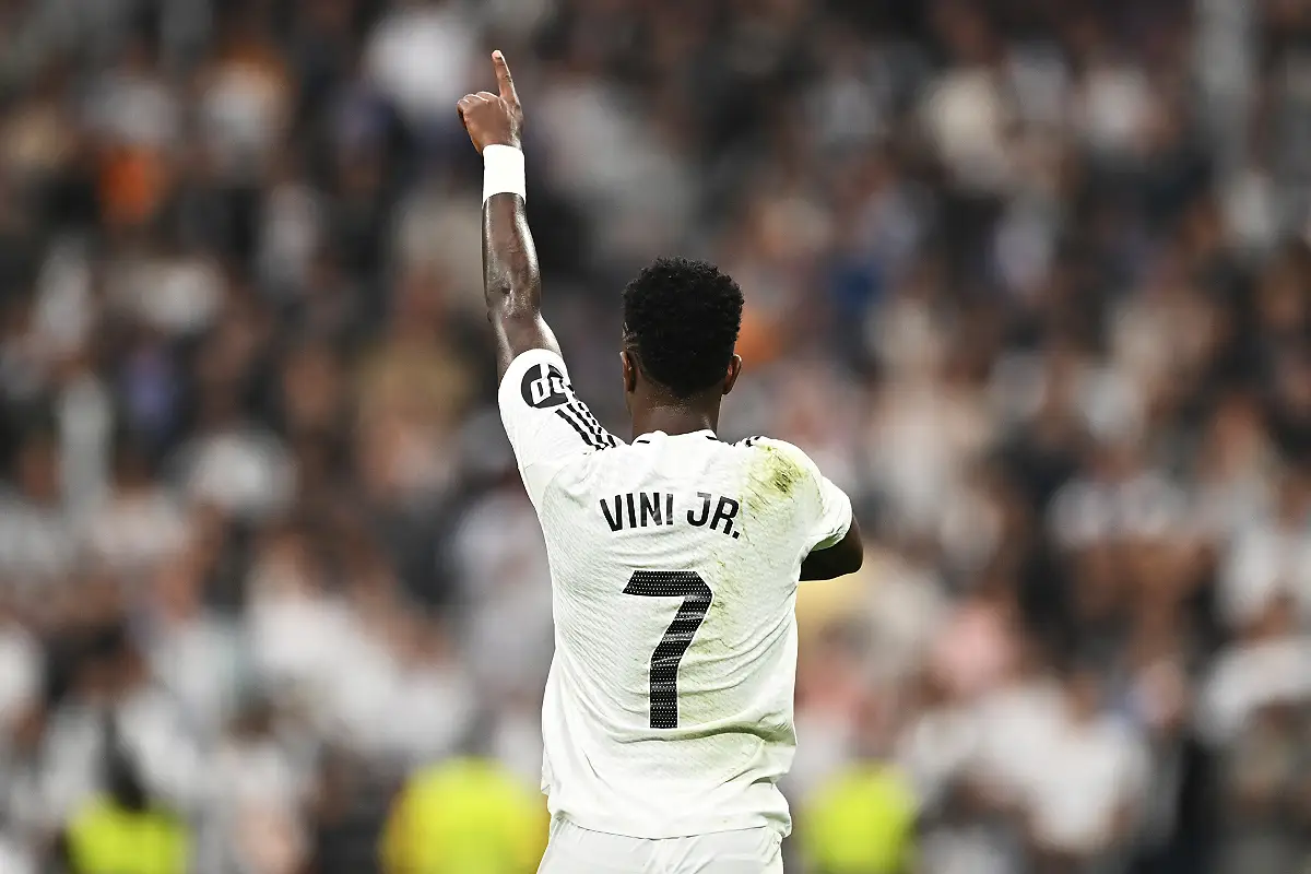 MADRID, SPAIN - NOVEMBER 09: Vinicius Jr of Real Madrid celebrates scoring his team's third goal during the LaLiga match between Real Madrid CF and CA Osasuna at Estadio Santiago Bernabeu on November 09, 2024 in Madrid, Spain. (Photo by Denis Doyle/Getty Images)
