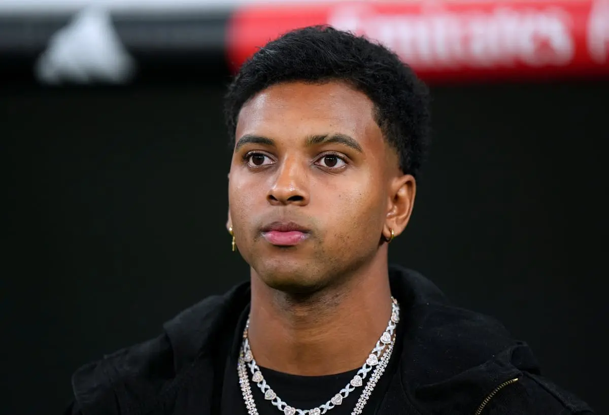 MADRID, SPAIN - OCTOBER 26: Rodrygo of Real Madrid looks on from the sidelines prior to the LaLiga match between Real Madrid CF and FC Barcelona at Estadio Santiago Bernabeu on October 26, 2024 in Madrid, Spain. (Photo by Angel Martinez/Getty Images)