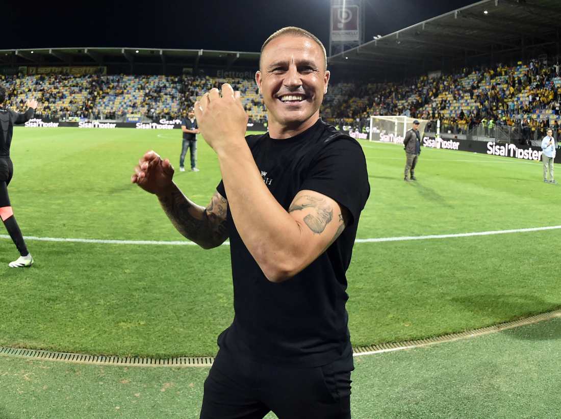 FROSINONE, ITALY - MAY 26: Fabio Cannavaro head coach of Udinese Calcio celebrates the victory thanks to which Udinese Calcio remains in Seria A after the Serie A TIM match between Frosinone Calcio and Udinese Calcio at Stadio Benito Stirpe on May 26, 2024 in Frosinone, Italy. (Photo by Giuseppe Bellini/Getty Images)