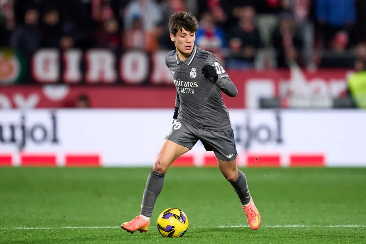 GIRONA, SPAIN - DECEMBER 07: Arda Guler of Real Madrid CF runs with the ball during the LaLiga match between Girona FC and Real Madrid CF at Montilivi Stadium on December 07, 2024 in Girona, Spain. (Photo by Alex Caparros/Getty Images)