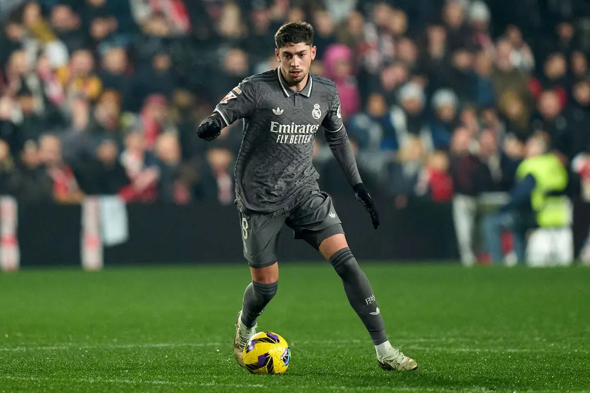 MADRID, SPAIN - DECEMBER 14: Federico Valverde of Real Madrid runs with the ball during the LaLiga match between Rayo Vallecano and Real Madrid CF at Estadio de Vallecas on December 14, 2024 in Madrid, Spain. (Photo by Angel Martinez/Getty Images)