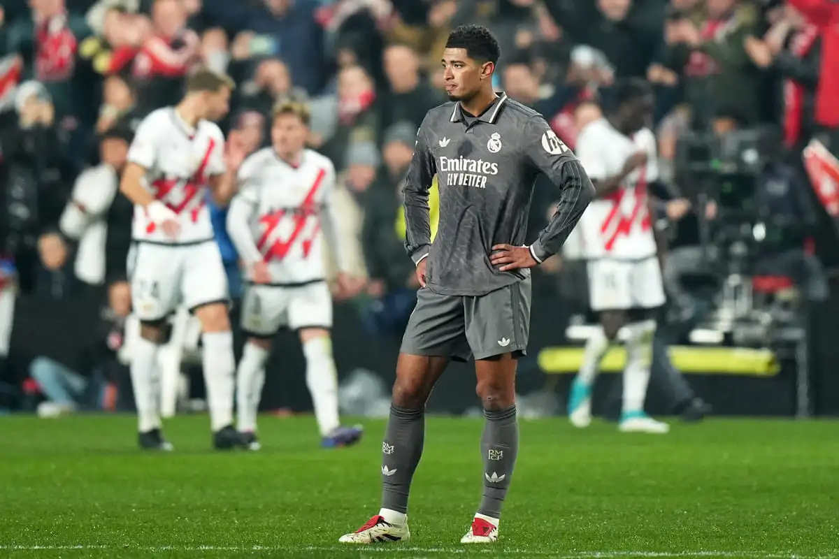 MADRID, SPAIN - DECEMBER 14: Jude Bellingham of Real Madrid appears dejected after Abdul Mumin of Rayo Vallecano scores his team's second goal during the LaLiga EA Sports match between Rayo Vallecano and Real Madrid at Estadio de Vallecas on December 14, 2024 in Madrid, Spain. (Photo by Angel Martinez/Getty Images)