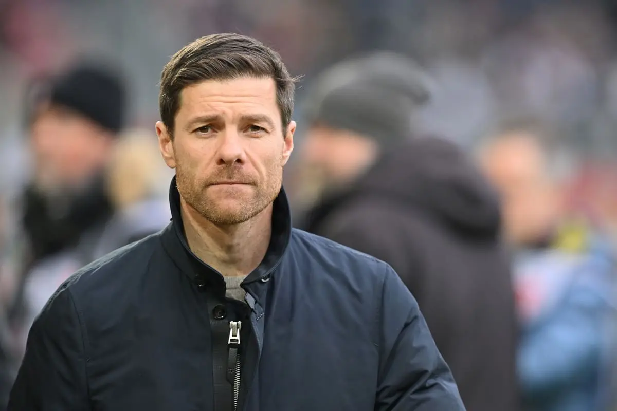 AUGSBURG, GERMANY - DECEMBER 14: Head coach Xabi Alonso of Bayer 04 Leverkusen looks on prior to the Bundesliga match between FC Augsburg and Bayer 04 Leverkusen at WWK-Arena on December 14, 2024 in Augsburg, Germany. (Photo by Sebastian Widmann/Getty Images)