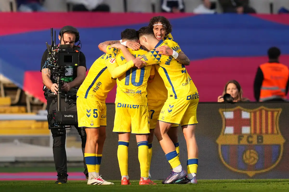 BARCELONA, SPAIN - NOVEMBER 30: Fabio Silva of UD Las Palmas celebrates with teammates after scoring his team's second goal during the LaLiga match between FC Barcelona and UD Las Palmas at Estadi Olimpic Lluis Companys on November 30, 2024 in Barcelona, Spain. (Photo by Alex Caparros/Getty Images)