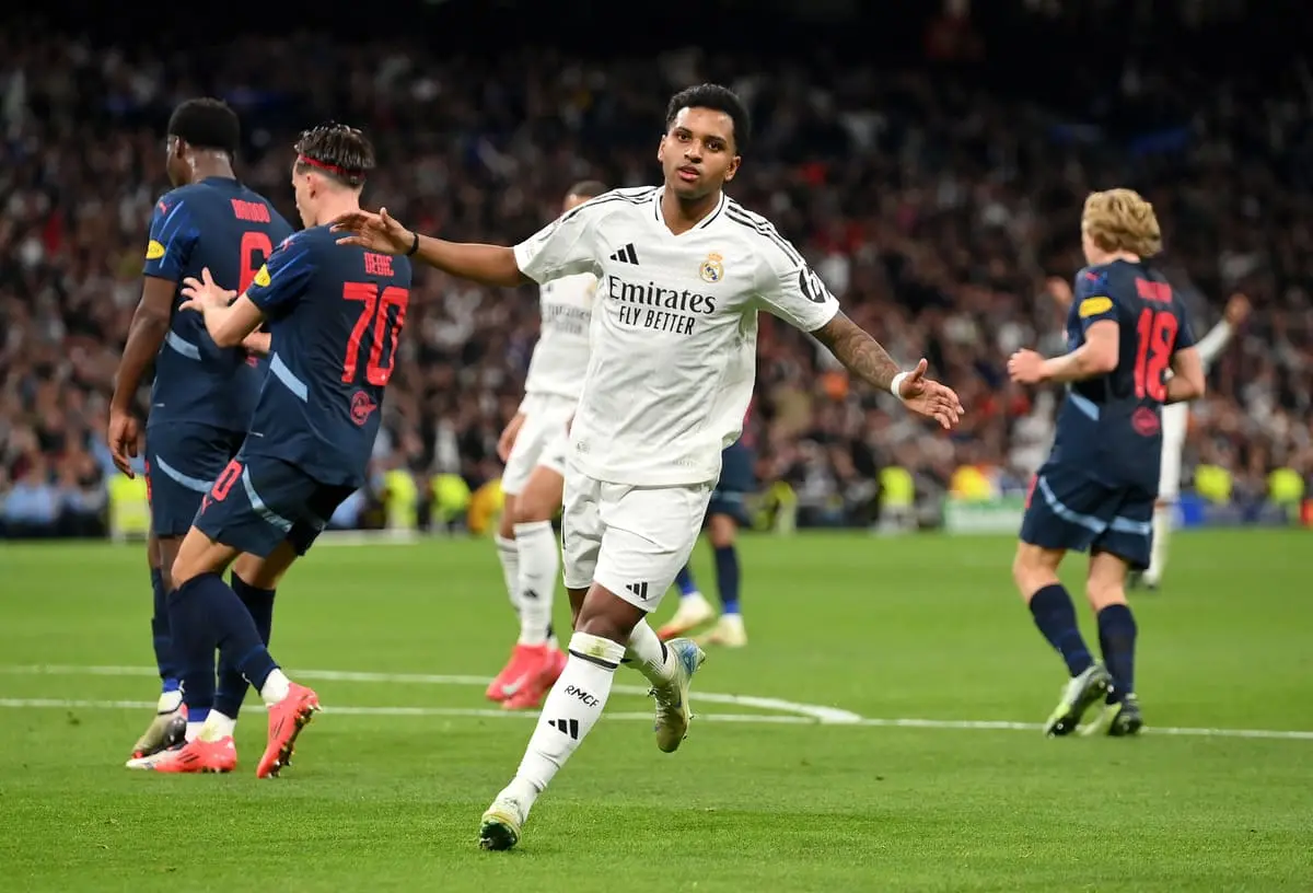 MADRID, SPAIN - JANUARY 22: Rodrygo of Real Madrid celebrates scoring his team's second goal during the UEFA Champions League 2024/25 League Phase MD7 match between Real Madrid C.F. and FC Salzburg at Estadio Santiago Bernabeu on January 22, 2025 in Madrid, Spain. (Photo by Denis Doyle/Getty Images).