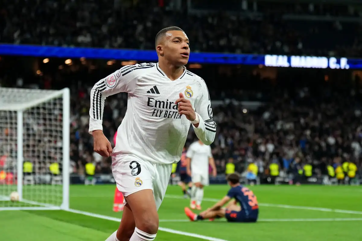 MADRID, SPAIN - JANUARY 16: Kylian Mbappe of Real Madrid celebrates scoring his team's first goal during the Copa Del Rey match between Real Madrid and Celta de Vigo at Estadio Santiago Bernabeu on January 16, 2025 in Madrid, Spain. (Photo by Angel Martinez/Getty Images)