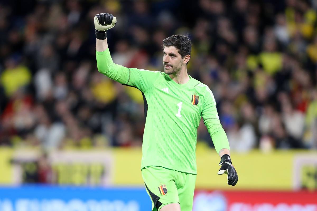 STOCKHOLM, SWEDEN - MARCH 24: Thibaut Courtois of Belgium celebrates after teammate Romelu Lukaku scored the team's third goal during the UEFA EURO 2024 qualifying round group F match between Sweden and Belgium at Friends Arena on March 24, 2023 in Stockholm, Sweden. (Photo by Linnea Rheborg/Getty Images)