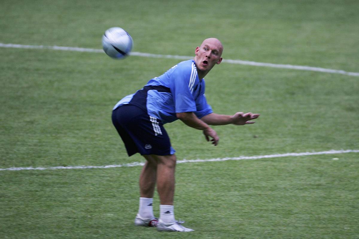 BEIJING, CHINA - JULY 21: Real Madrid's Thomas Gravesen shows his soccer skills during a training session at the Workers' Stadium on July 21, 2005 in Beijing, China. Real Madrid are on a four-day visit to China where they will play local team Beijing Hyundai at the Workers' Stadium on July 23, 2005. (Photo by Cancan Chu/Getty Images)