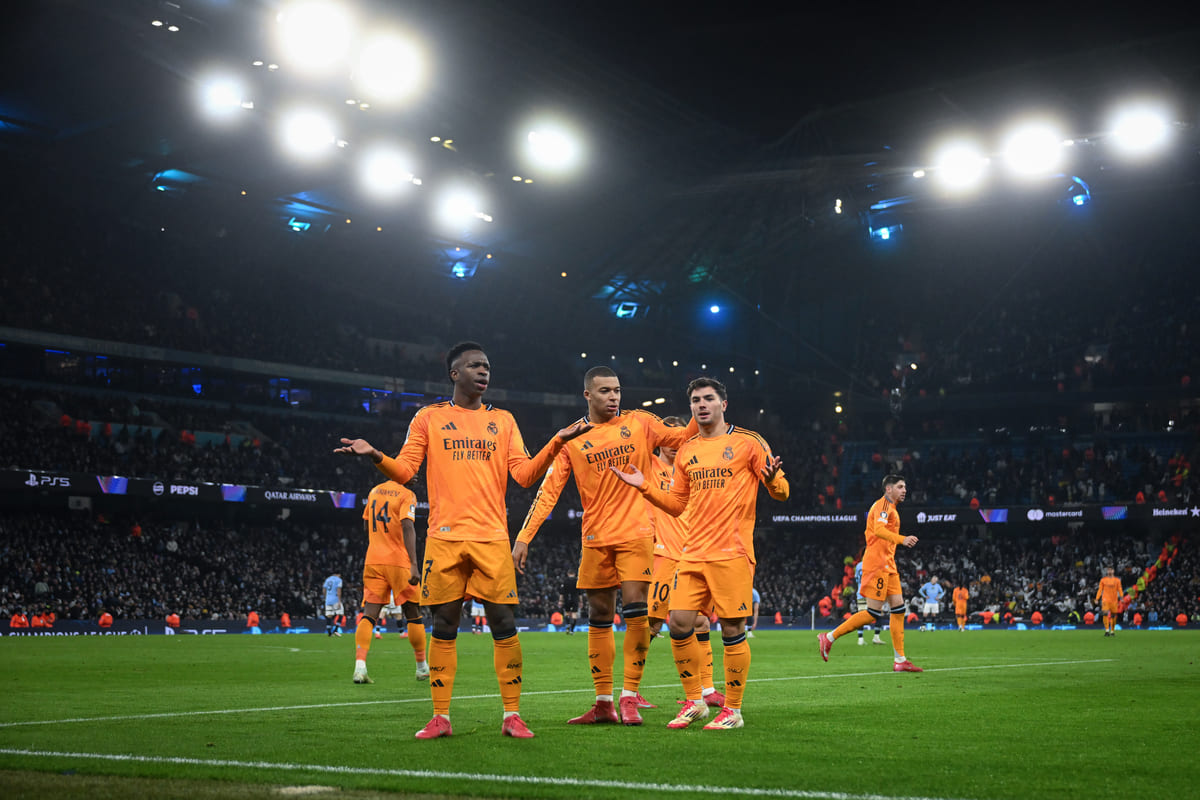 MANCHESTER, ENGLAND - FEBRUARY 11: Brahim Diaz of Real Madrid celebrates scoring his team's second goal with Vinicius Junior and Kylian Mbappe during the UEFA Champions League 2024/25 League Knockout Play-off first leg match between Manchester City and Real Madrid C.F. at Manchester City Stadium on February 11, 2025 in Manchester, England. (Photo by Michael Regan/Getty Images)