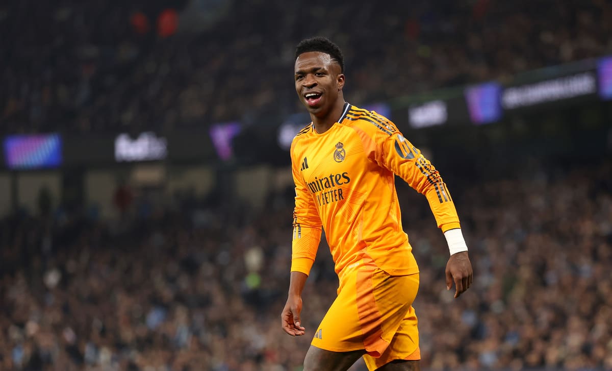 MANCHESTER, ENGLAND - FEBRUARY 11: Vinicius Junior of Real Madrid during the UEFA Champions League 2024/25 League Knockout Play-off first leg match between Manchester City and Real Madrid C.F. at Manchester City Stadium on February 11, 2025 in Manchester, England. (Photo by Carl Recine/Getty Images)