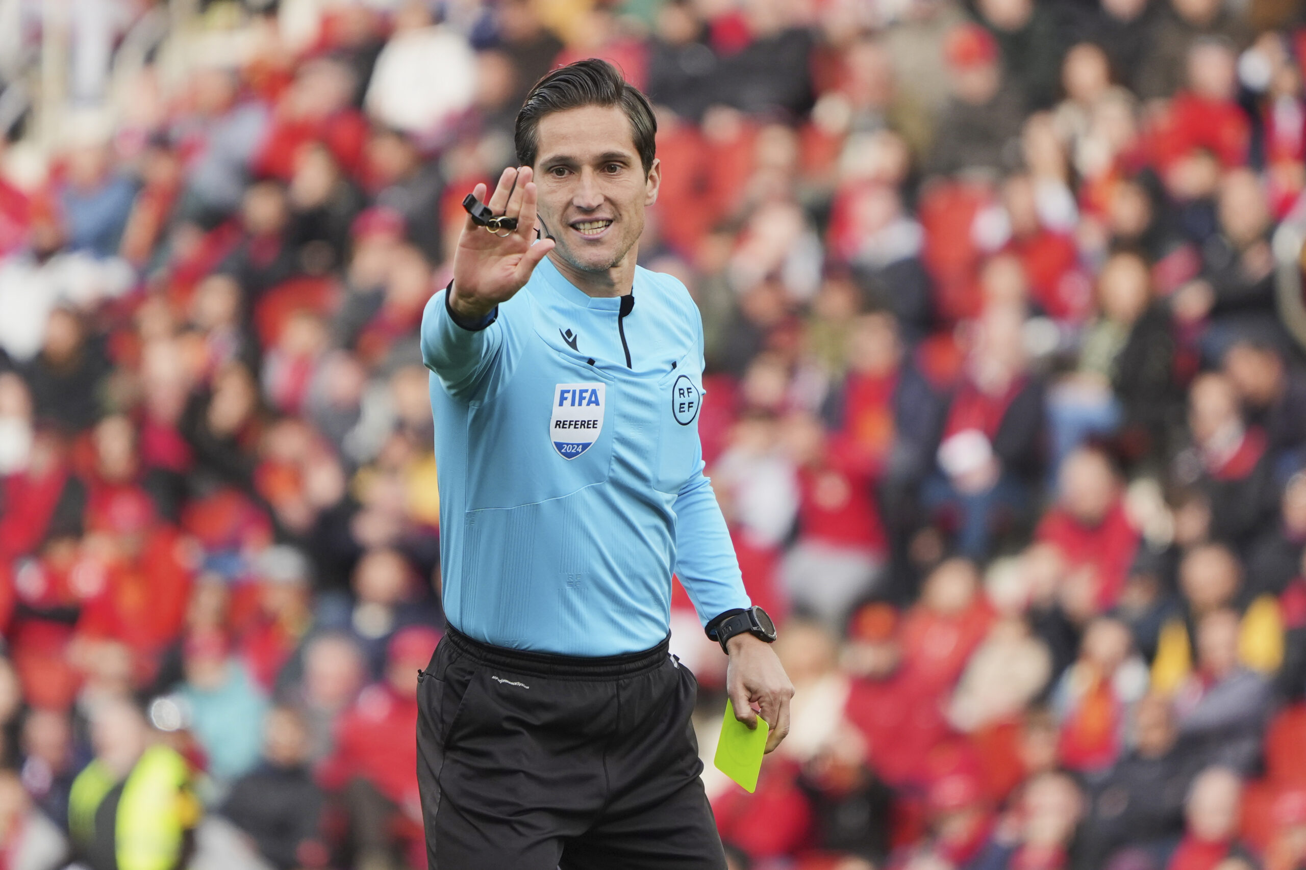 MALLORCA, SPAIN - FEBRUARY 11: Referee, Jose Luis Munuera Montero shows yellow card to Matija Nastasic of RCD Mallorca during the LaLiga EA Sports match between RCD Mallorca and Rayo Vallecano at Estadi de Son Moix on February 11, 2024 in Mallorca, Spain. (Photo by Rafa Babot/Getty Images)