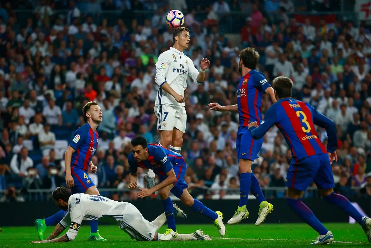 MADRID, SPAIN - APRIL 23: Cristiano Ronaldo of Real Madrid jumps highest to win a header during the La Liga match between Real Madrid CF and FC Barcelona at Estadio Bernabeu on April 23, 2017 in Madrid, Spain. (Photo by Gonzalo Arroyo Moreno/Getty Images)