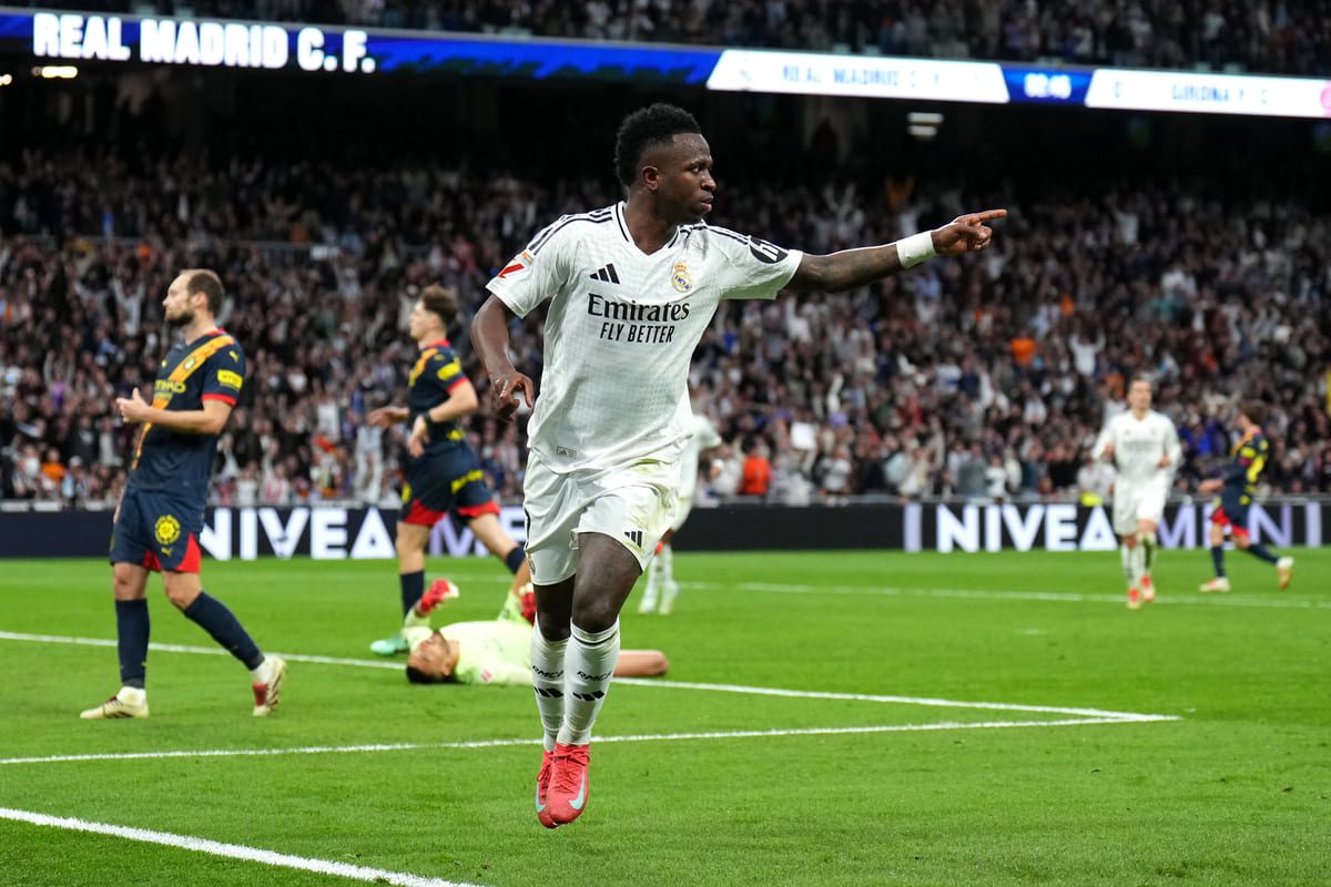 MADRID, SPAIN - FEBRUARY 23: Vinicius Jr. of Real Madrid celebrates scoring his team's second goal during the LaLiga match between Real Madrid CF and Girona FC at Estadio Santiago Bernabeu on February 23, 2025 in Madrid, Spain. (Photo by Angel Martinez/Getty Images)