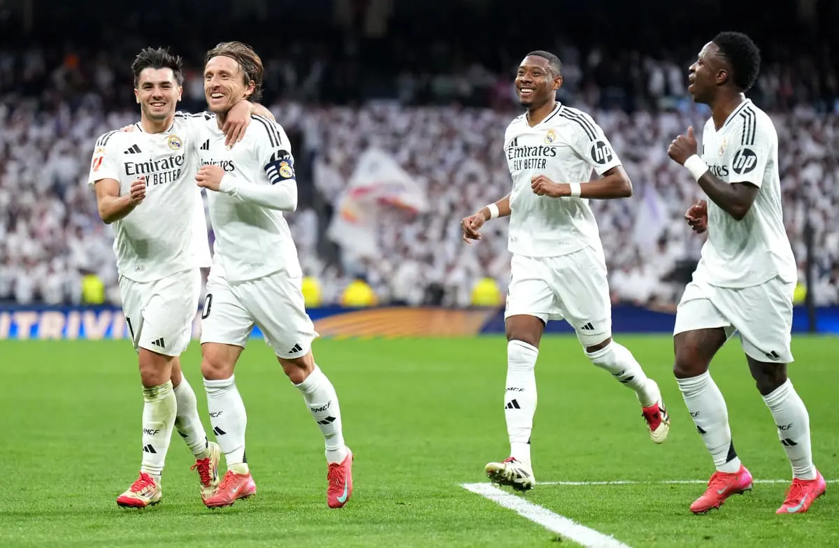 MADRID, SPAIN - FEBRUARY 23: Luka Modric of Real Madrid celebrates with teammate Brahim Diaz after scoring his team's first goal during the LaLiga match between Real Madrid CF and Girona FC at Estadio Santiago Bernabeu on February 23, 2025 in Madrid, Spain. (Photo by Angel Martinez/Getty Images).