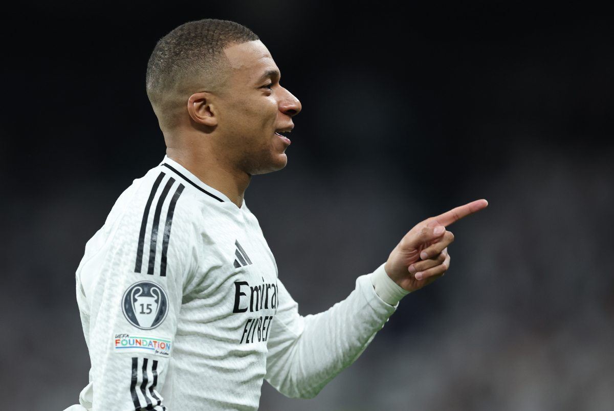 MADRID, SPAIN - FEBRUARY 19: Kylian Mbappe of Real Madrid celebrates scoring his team's first goal during the UEFA Champions League 2024/25 League Knockout Play-off second leg match between Real Madrid C.F. and Manchester City at Santiago Bernabeu Stadium on February 19, 2025 in Madrid, Spain. (Photo by Clive Brunskill/Getty Images)