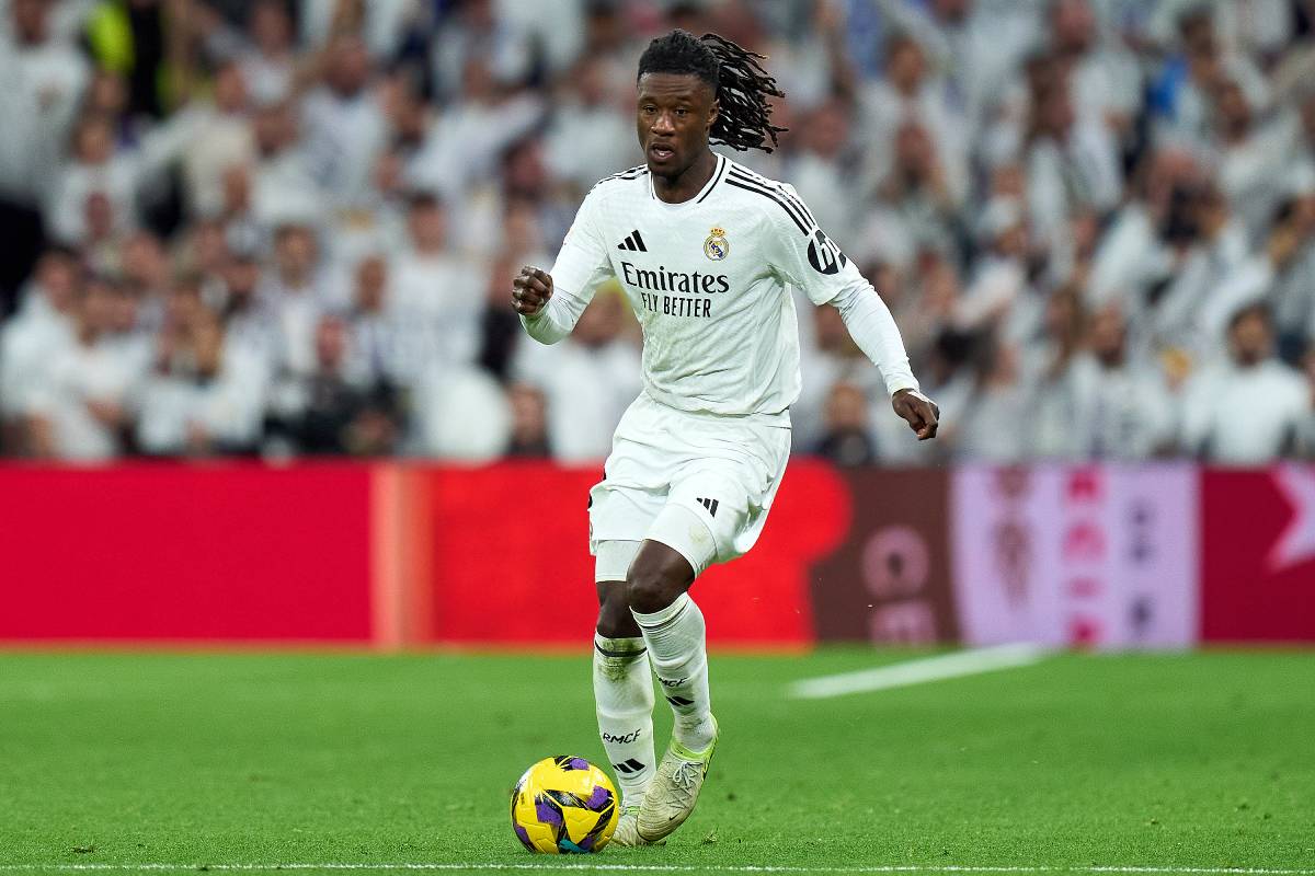 MADRID, SPAIN - DECEMBER 22: Eduardo Camavinga of Real Madrid runs with the ball during the LaLiga match between Real Madrid CF and Sevilla FC at Estadio Santiago Bernabeu on December 22, 2024 in Madrid, Spain. (Photo by Angel Martinez/Getty Images)